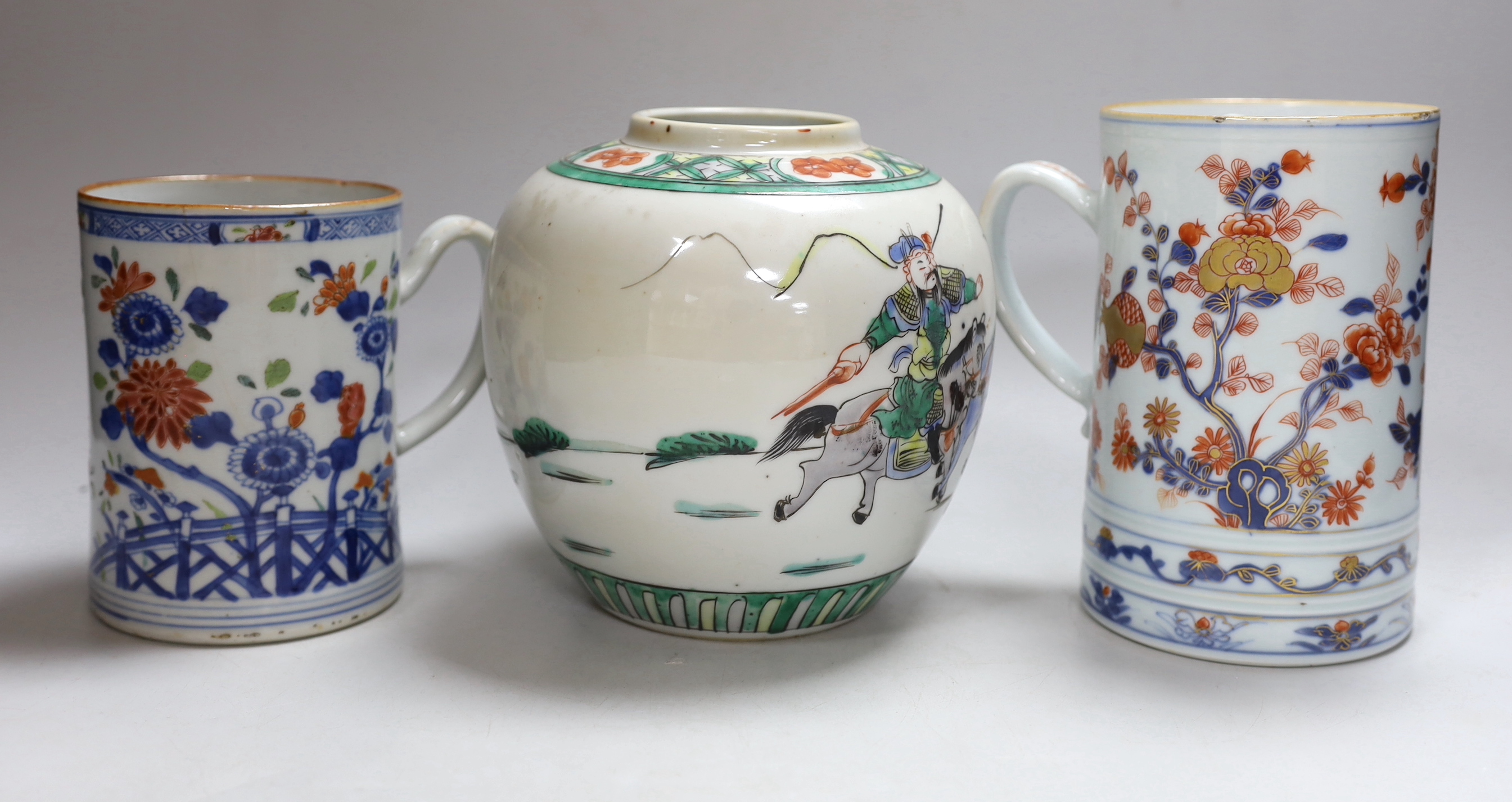 A Chinese Imari large mug, early 18th century, a Chinese famille rose mug, Qianlong period and a famille verte jar, tallest 17cm high